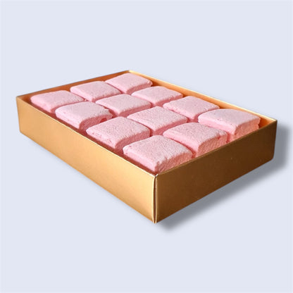 Gold gift box containing 12 Raspberry gourmet marshmallows, side view