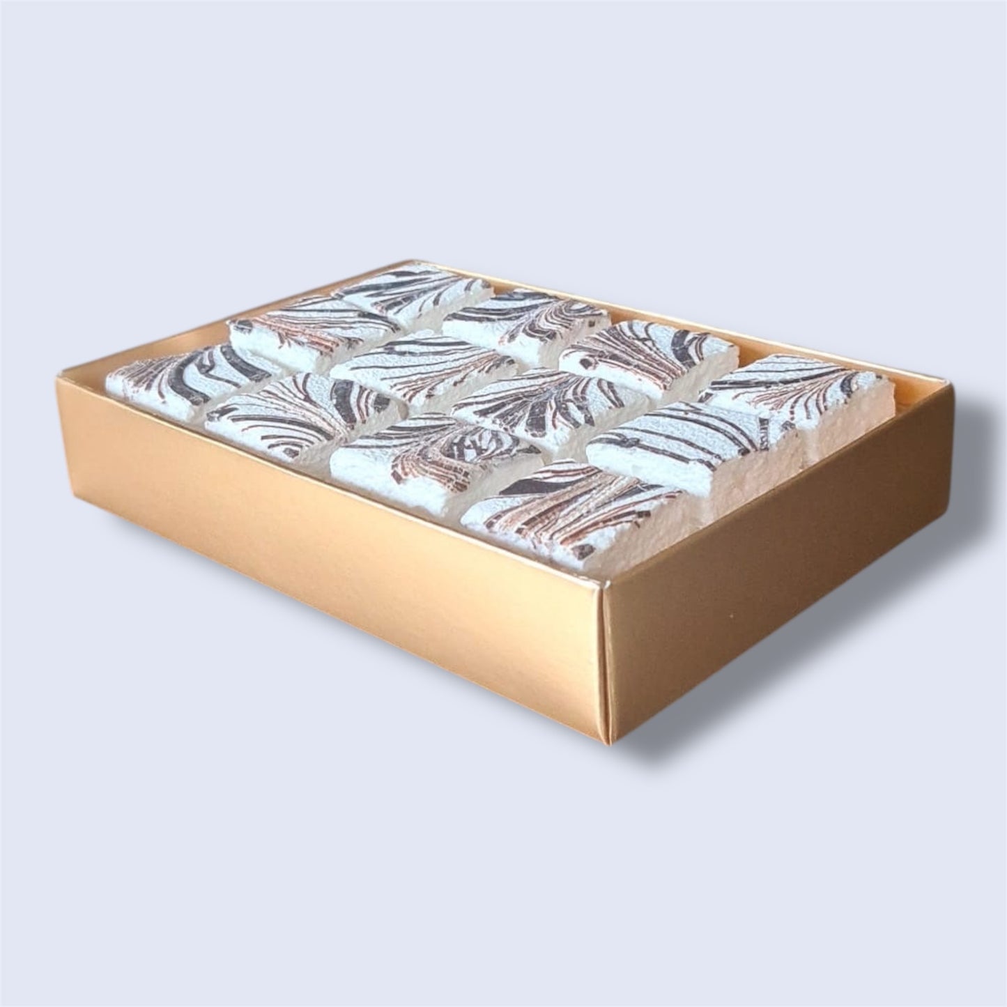 Gold gift box containing 12 Vanilla & chocolate gourmet marshmallows, side view